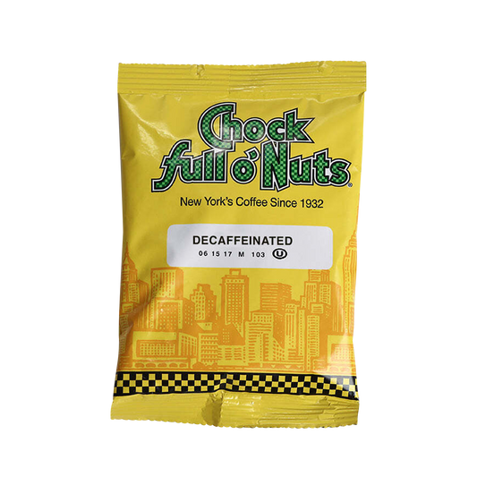 A yellow packet of Chock full o'Nuts Original Decaf with text stating "New York's Coffee Since 1932." The packet features an illustrated city skyline and a checkered border at the bottom.